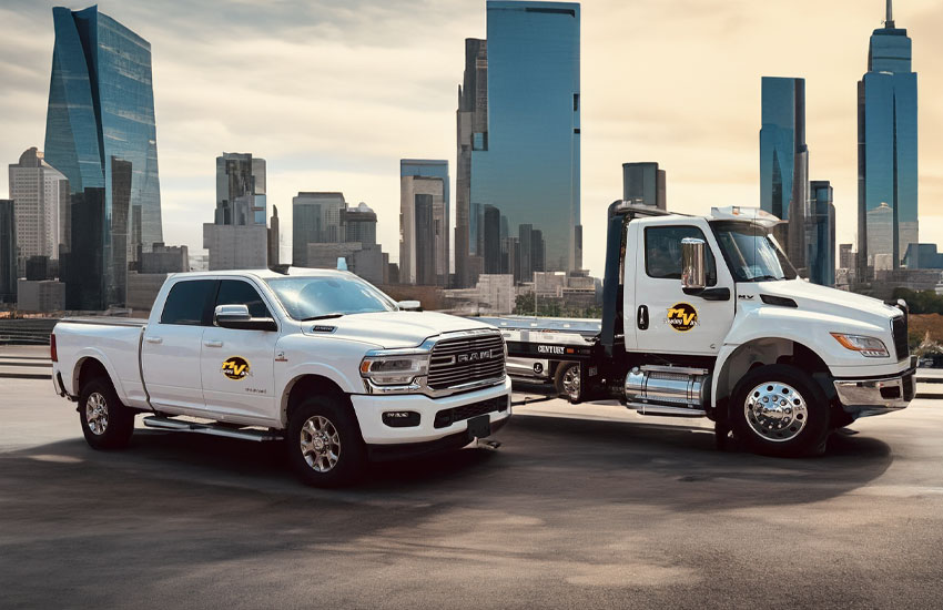 Motor Vehicle Towing and Transportation Services Flatbed truck and Pick up truck for car towing and transport services.